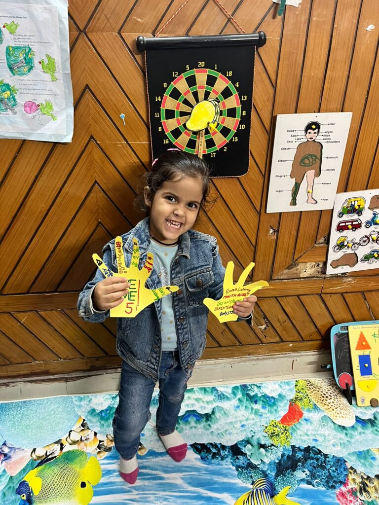 best tuition center near me in chandigarh:- kid with playcard best tuition center near me in chandigarh:- kid with playcard